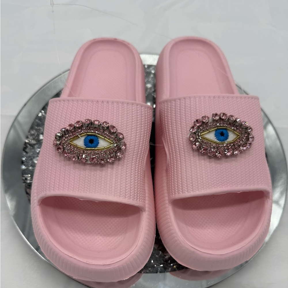 Pink rhinestone evil eye beach slide